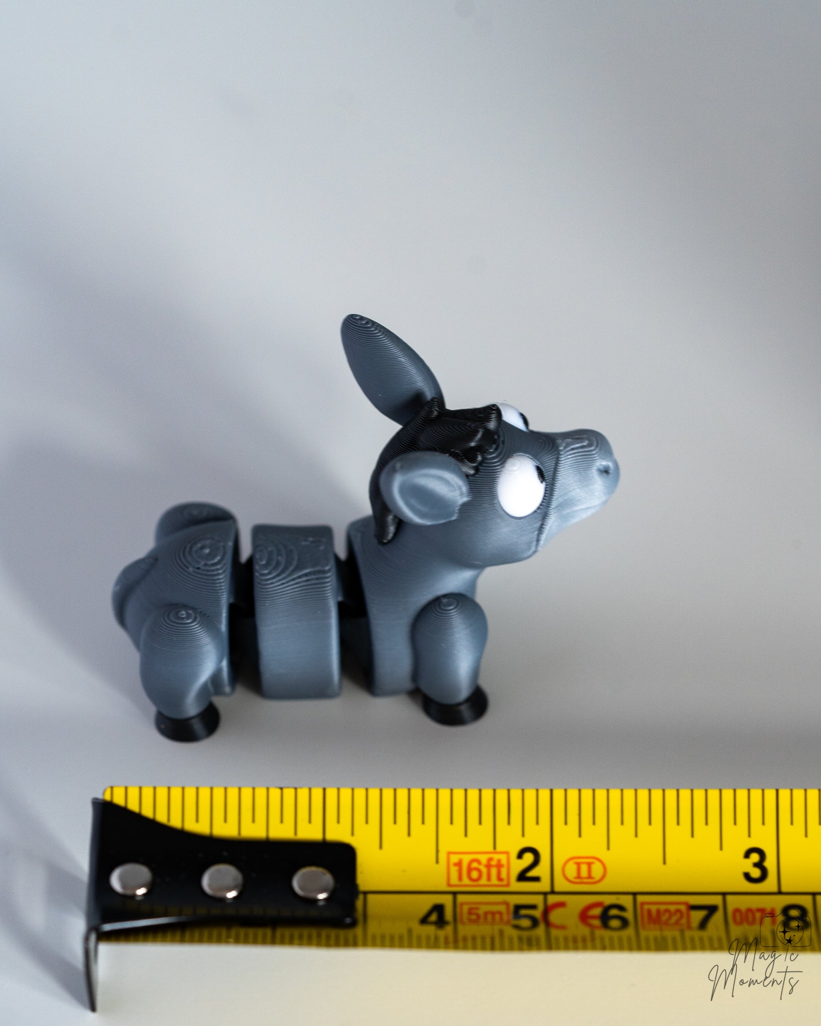 donkey figure next to measuring tape for scale