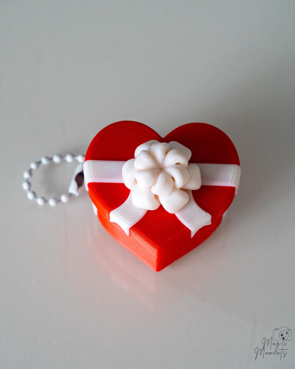 red heart clicker ornament
