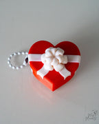 red heart clicker ornament