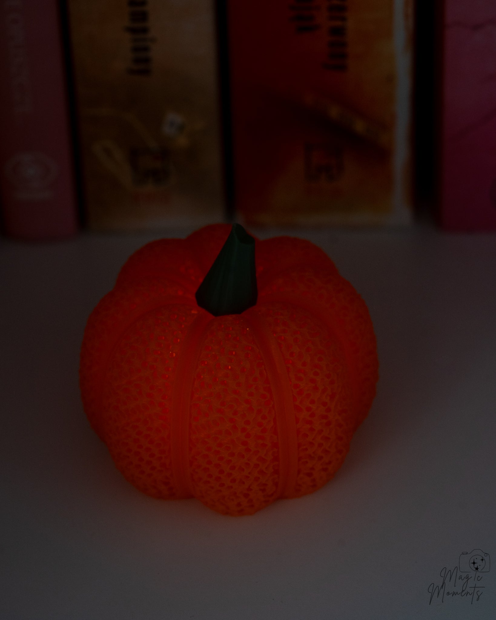 Textured mesh pumpkin glowing with LED tealight candle