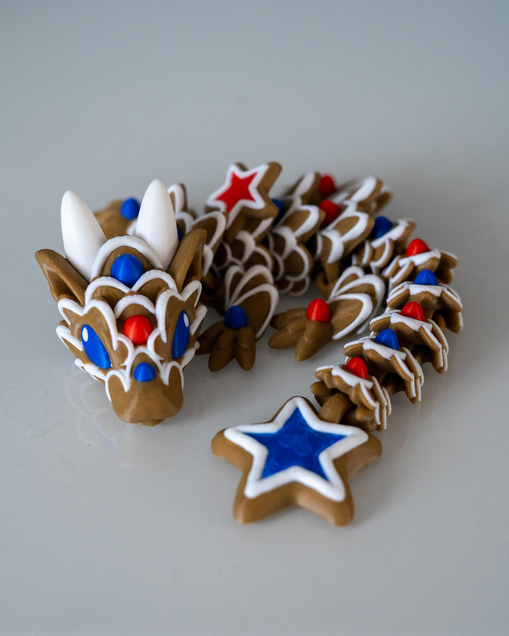 cute gingerbread dragon with star accents 3d printed fantasy creature