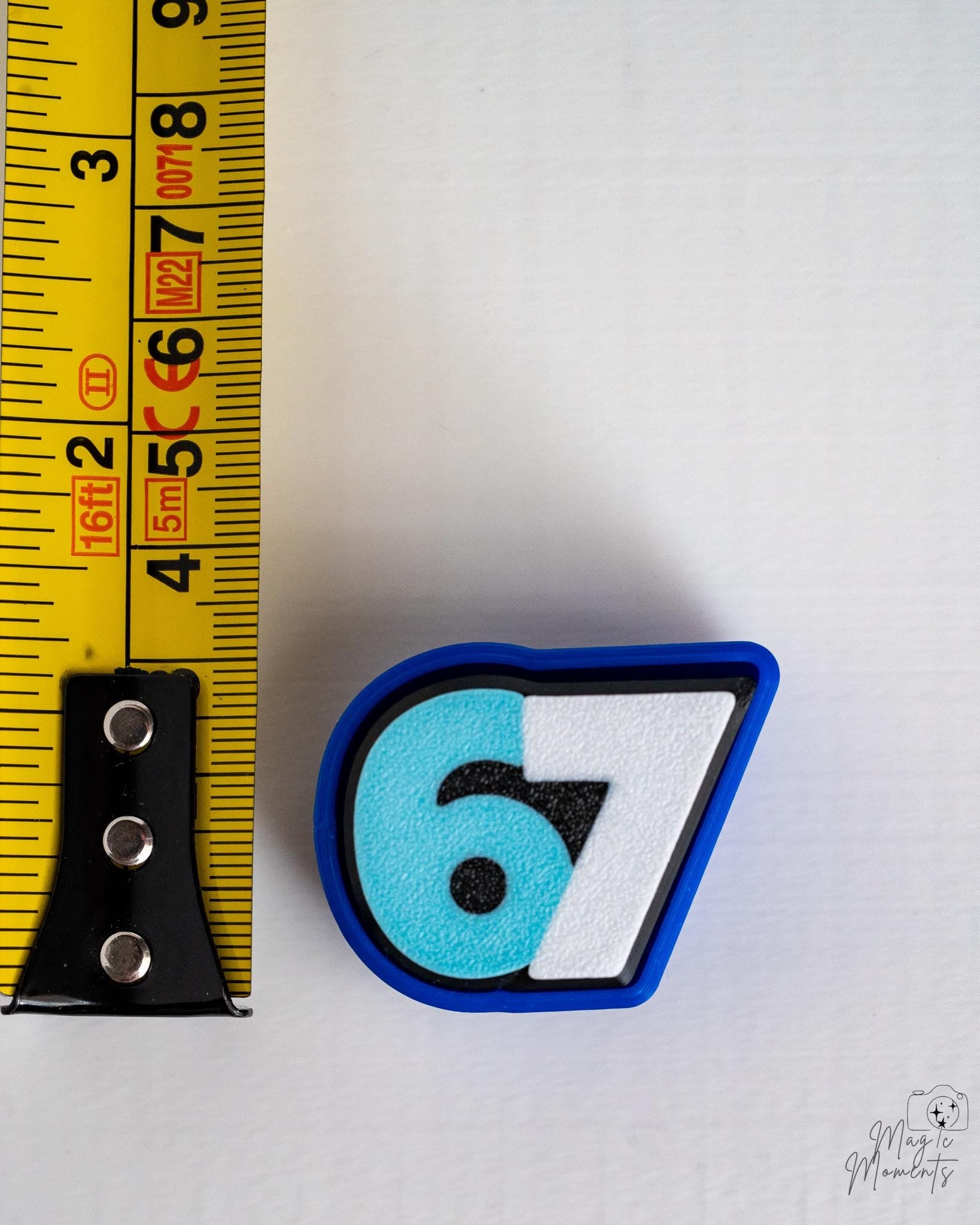 3d printed 67 clicker size reference keychain fidget