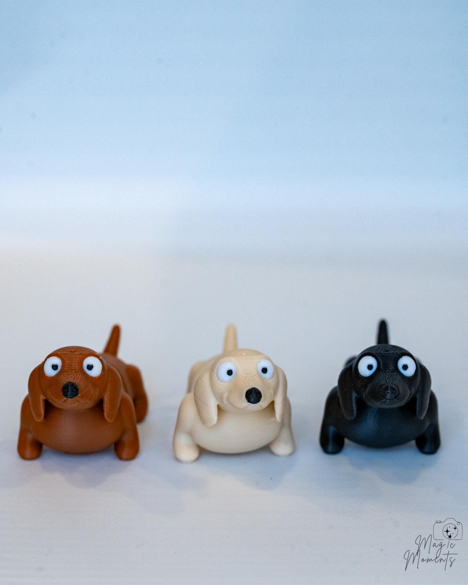Mini puppy figures in brown cream and black colours