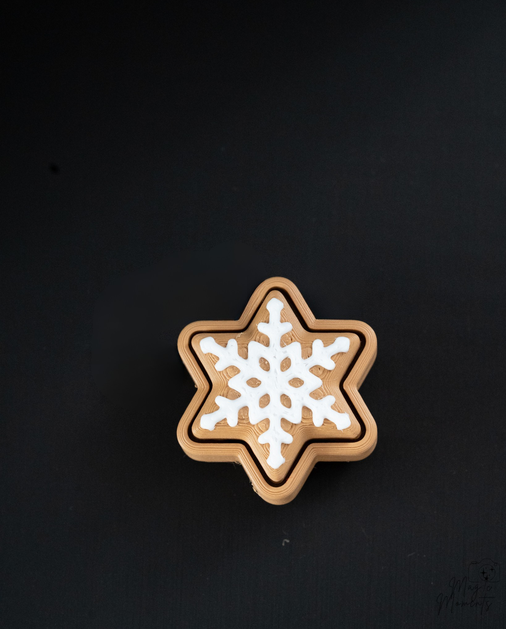 white icing gingerbread star clicker ornament