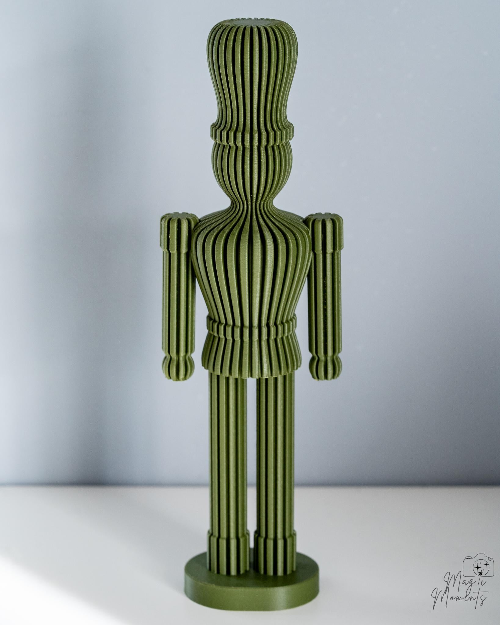 3D printed nutcracker figures with minimalist ribbed texture pattern