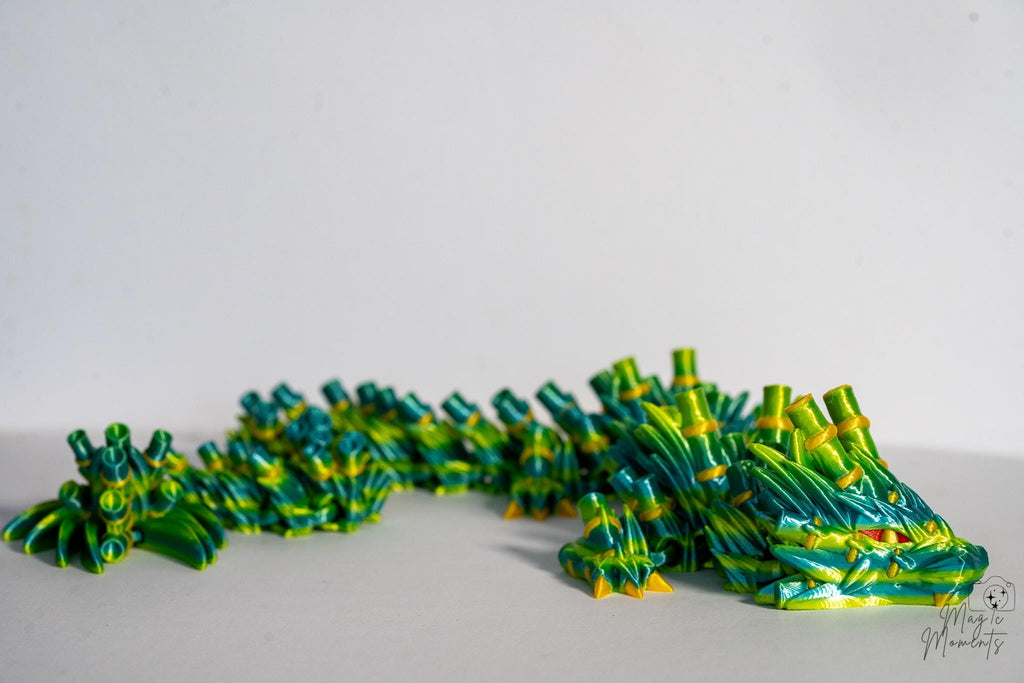 3D printed bamboo dragon decoration with detailed spike texture and flexible body