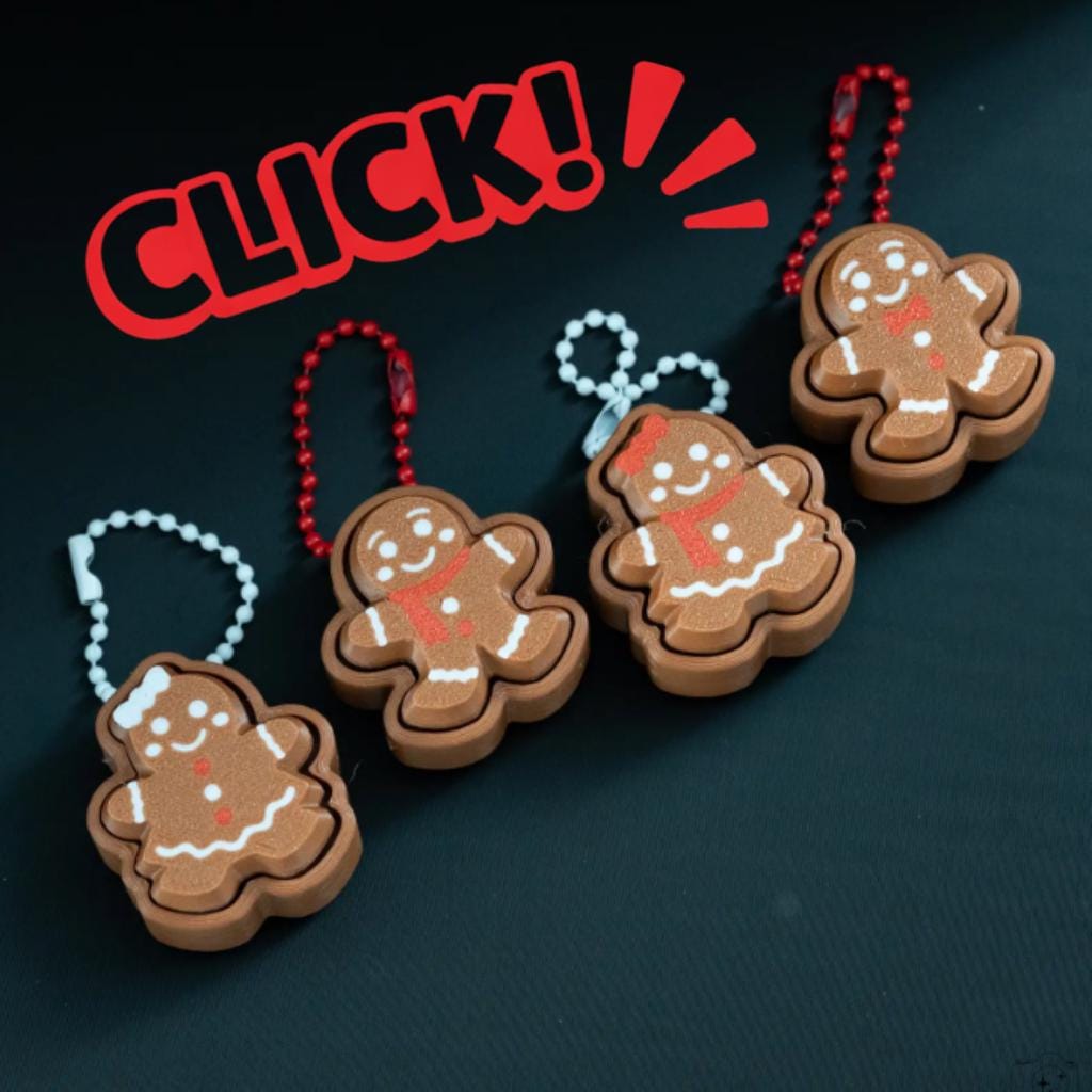 3D printed gingerbread clickers with hanging loops and icing details
