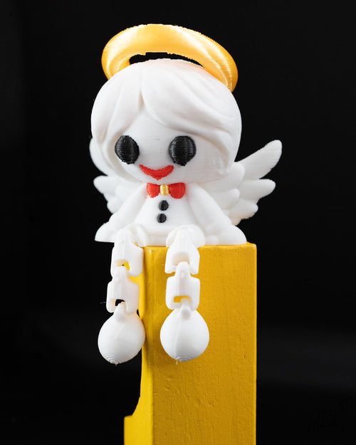 Angel Christmas shelf sitter decoration with halo and dangling legs