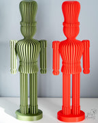 Modern nutcracker decoration set with ribbed spiral design in red and green