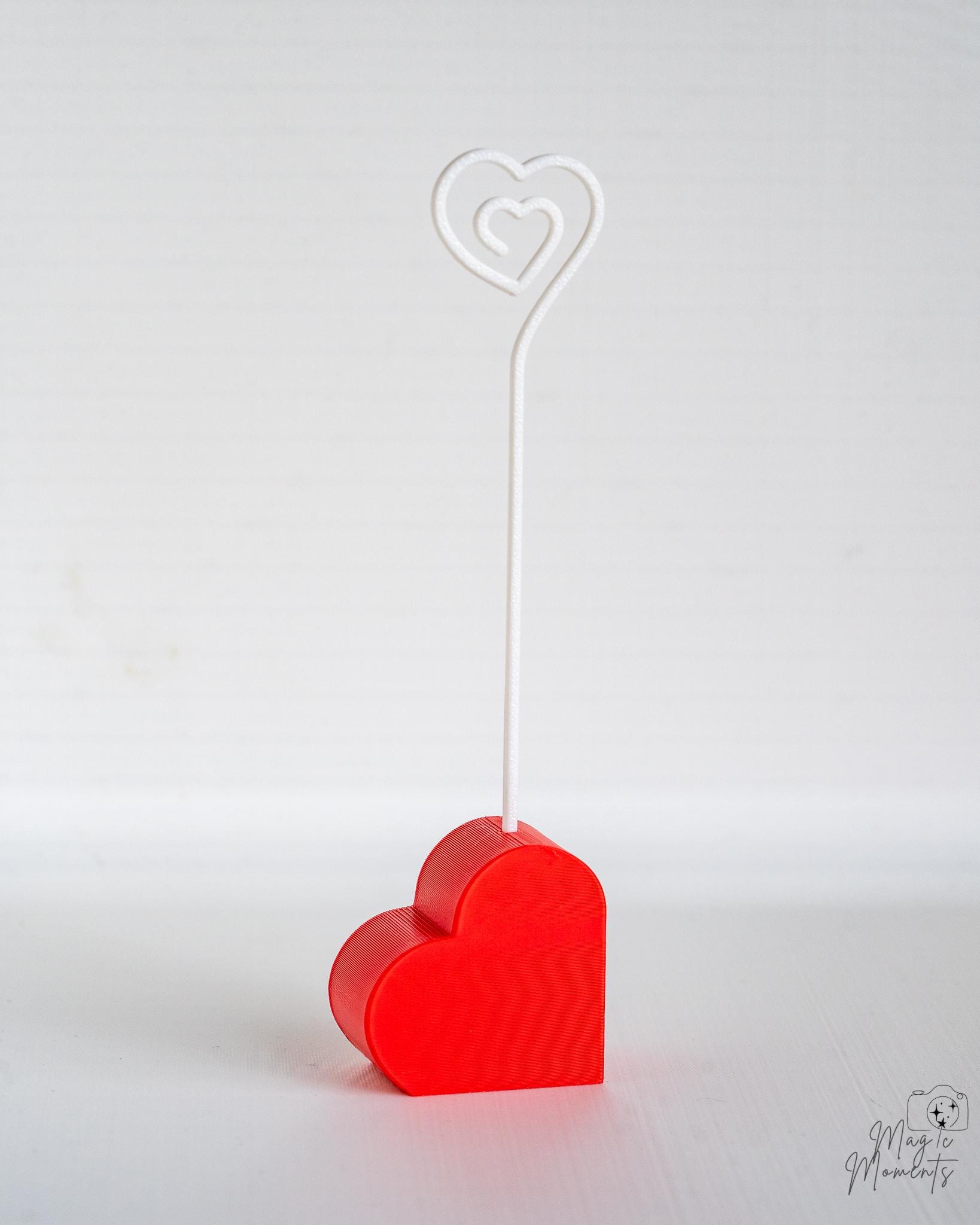 Heart shaped card holder with decorative wire clip design
