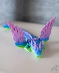 Winged articulated dragon with flexible segmented body