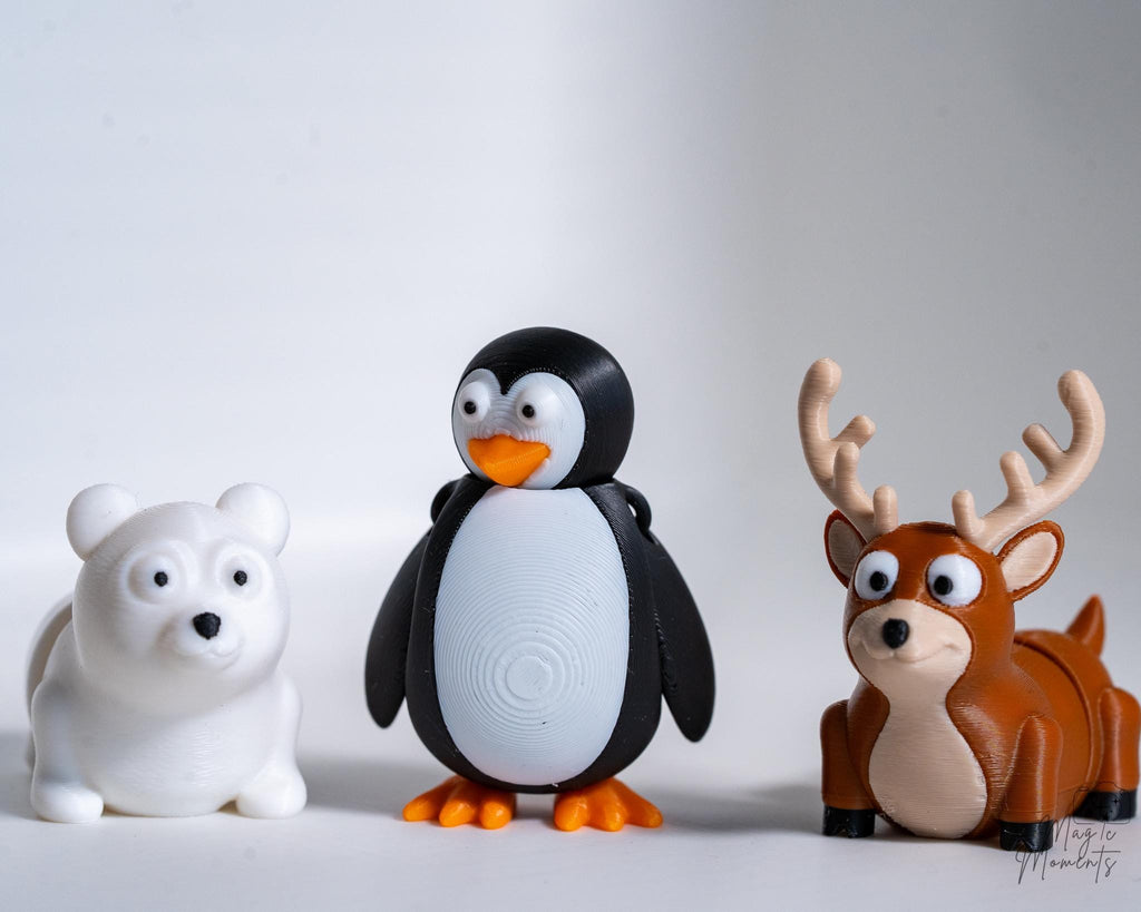 Winter animal figure set with reindeer and penguin decorations