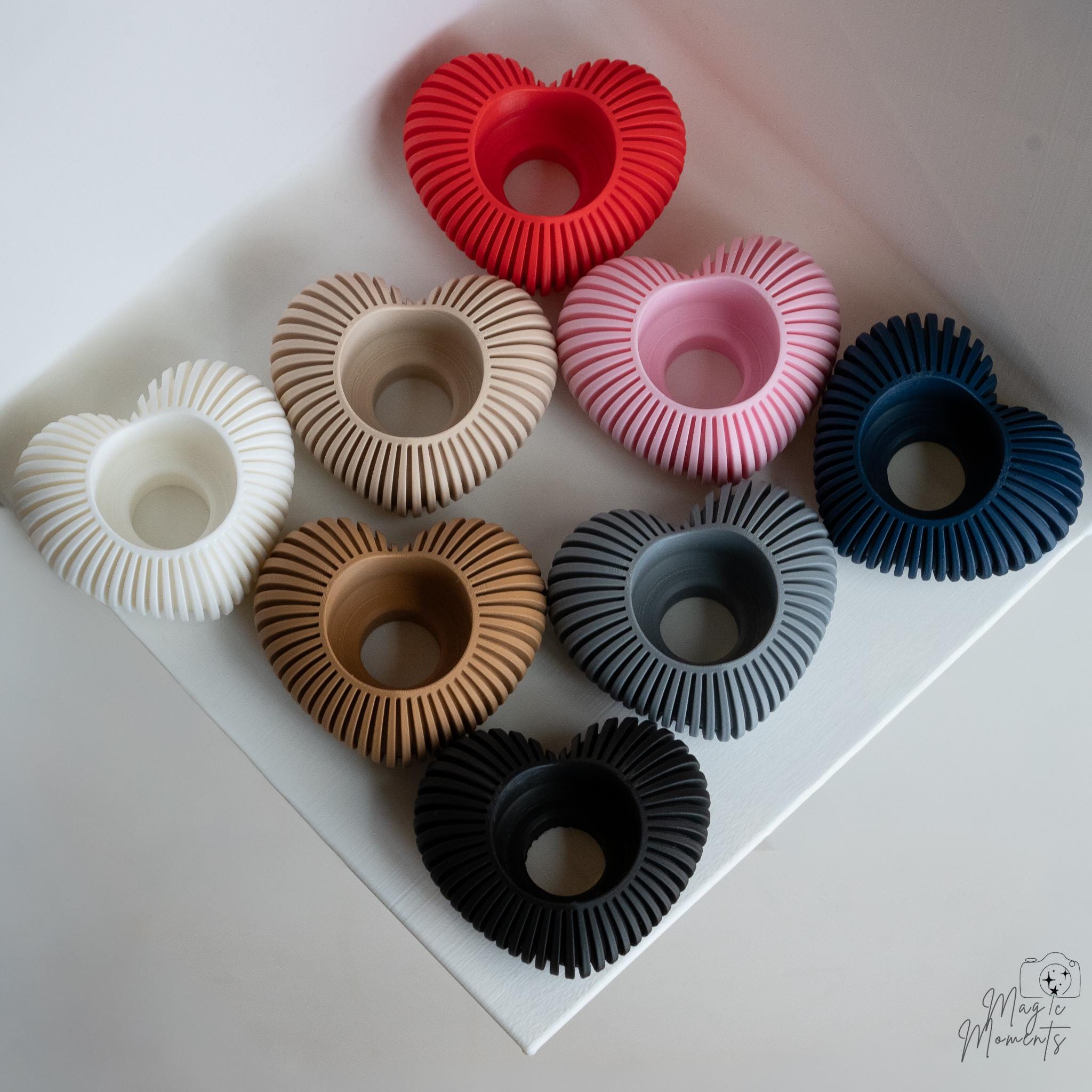 3D printed heart candle holders for LED tealights in multiple colours