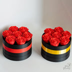 Round flower gift box with red roses