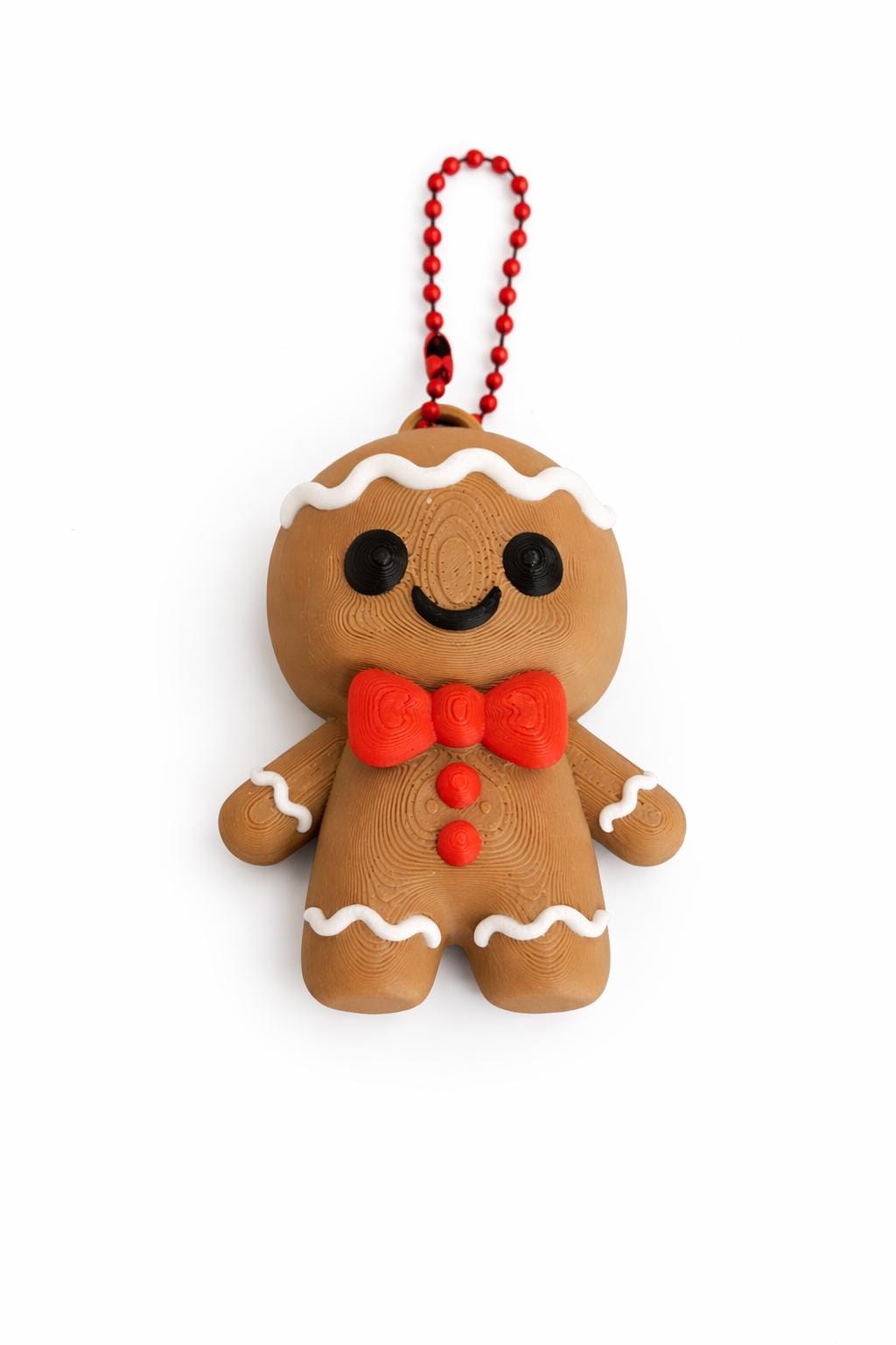 Gingerbread man keychain with hanging loop and festive cookie style design