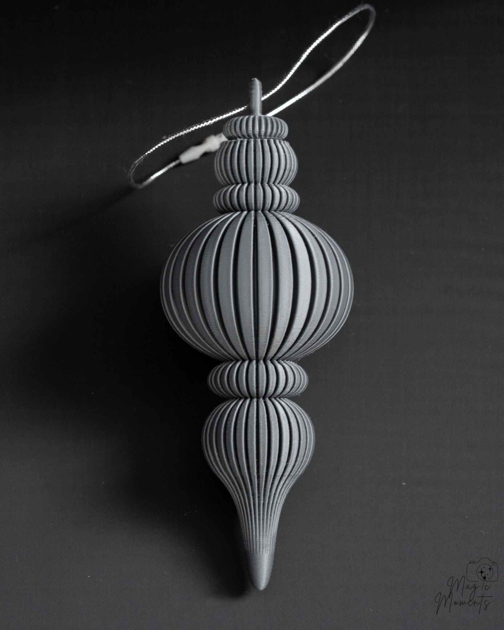 Grey hanging ornament with minimalist ribbed style
