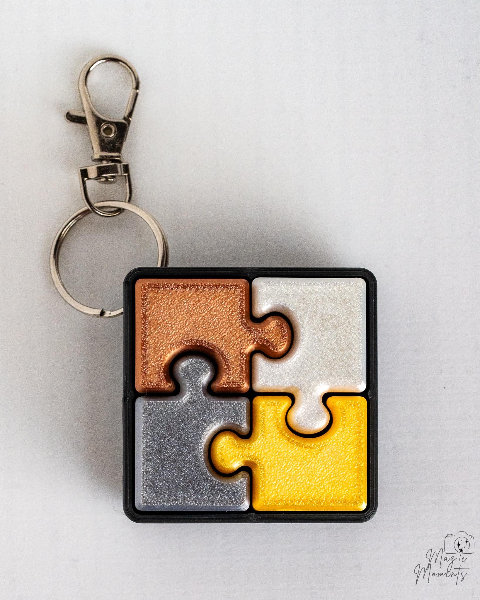 metallic puzzle clicker keychain