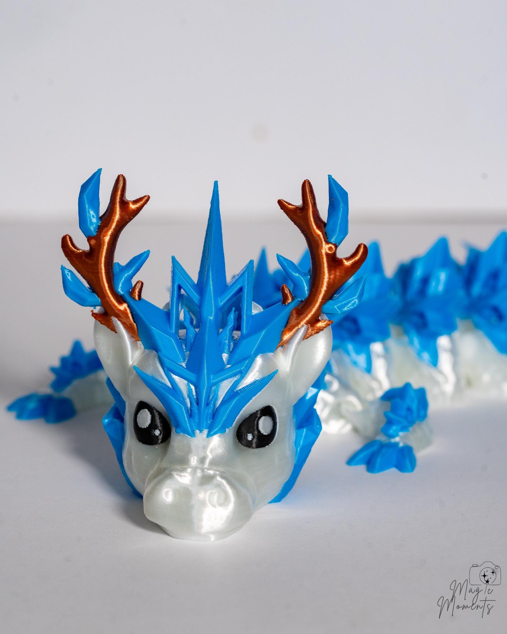Ice dragon articulated figure with crystal spikes and antler details