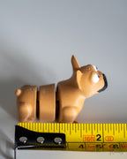 french bulldog Articulated dog figure next to measuring tape for scale