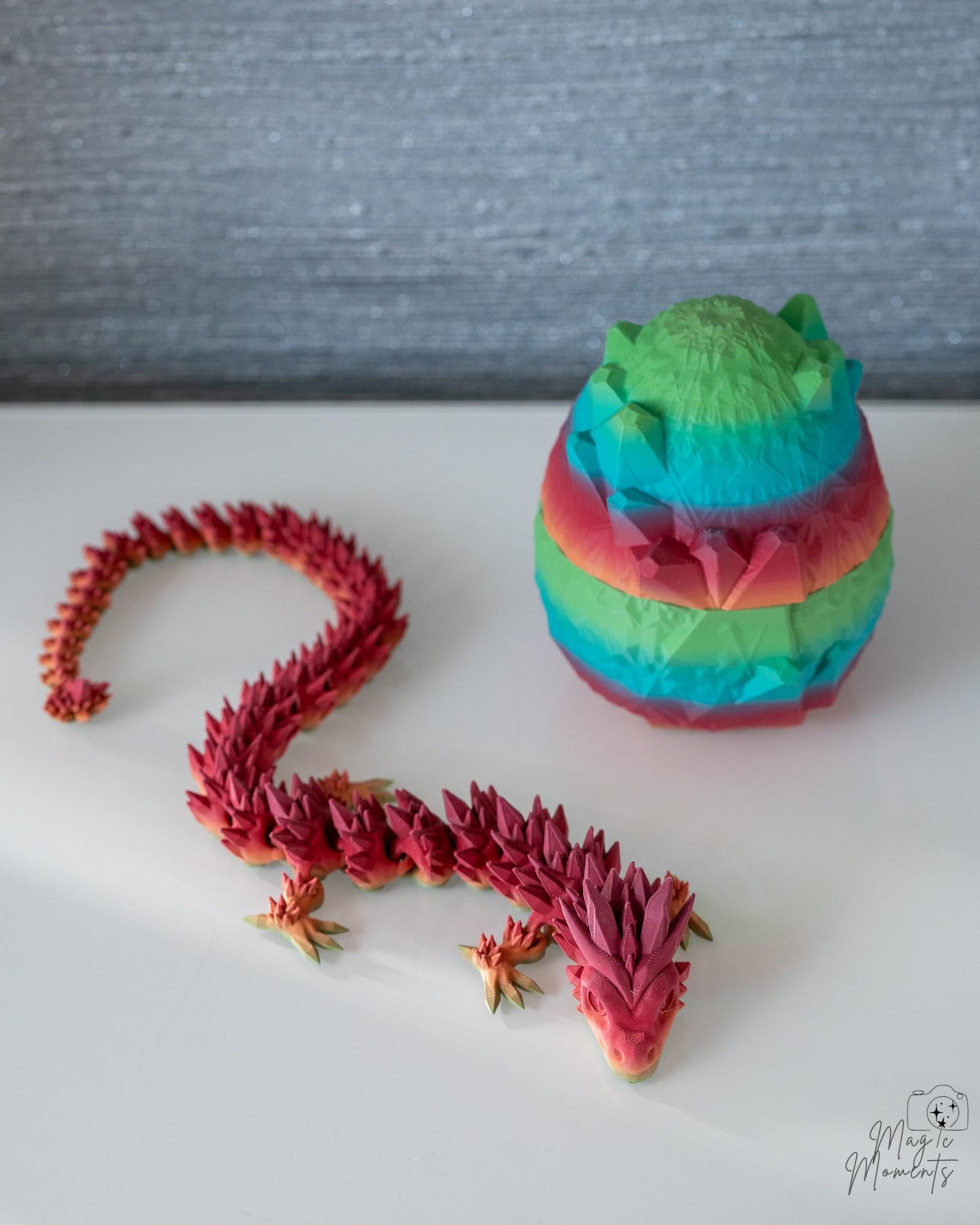 Articulated crystal dragon with rainbow dragon egg