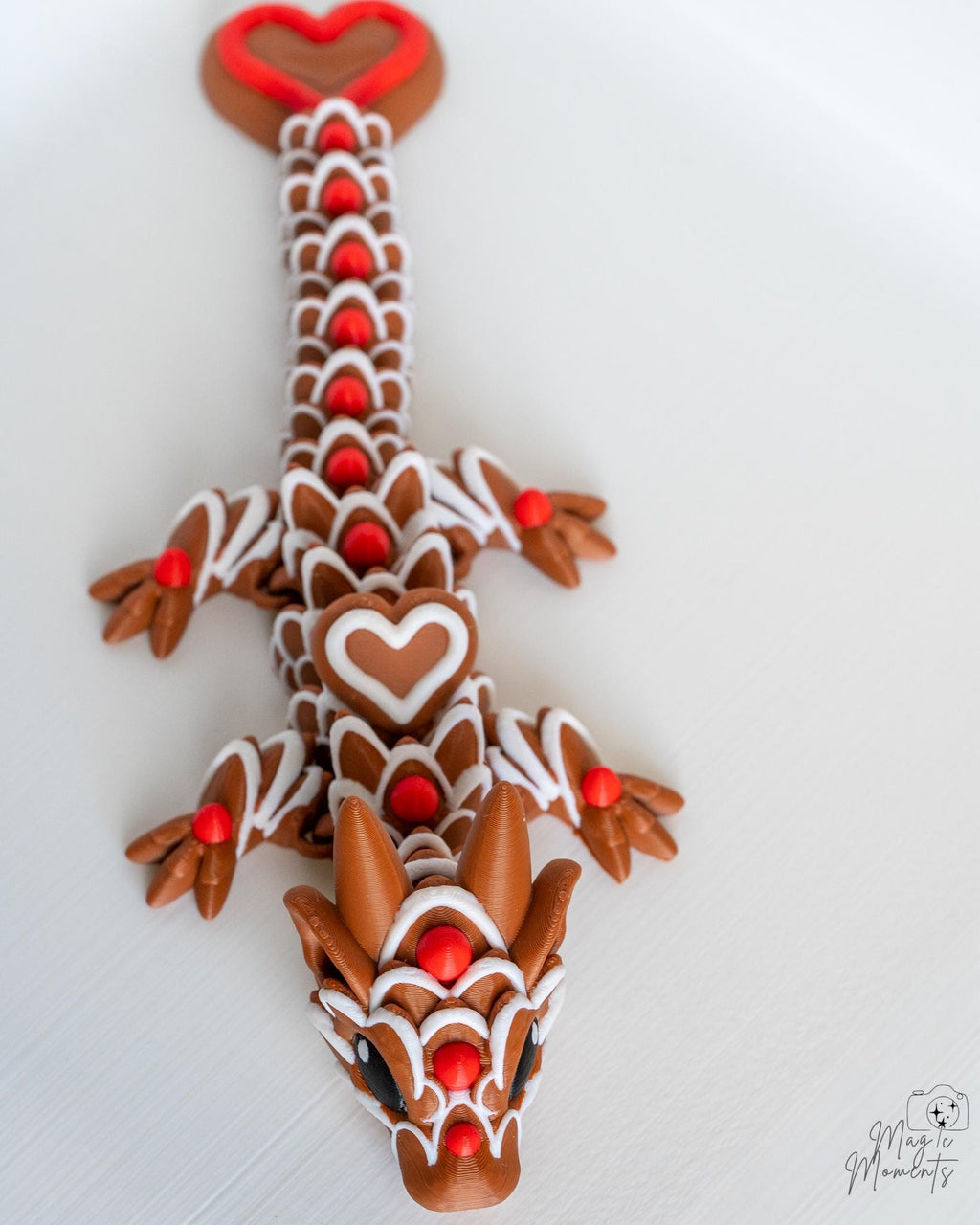 Top view of Valentine dragon figure with heart themed pattern