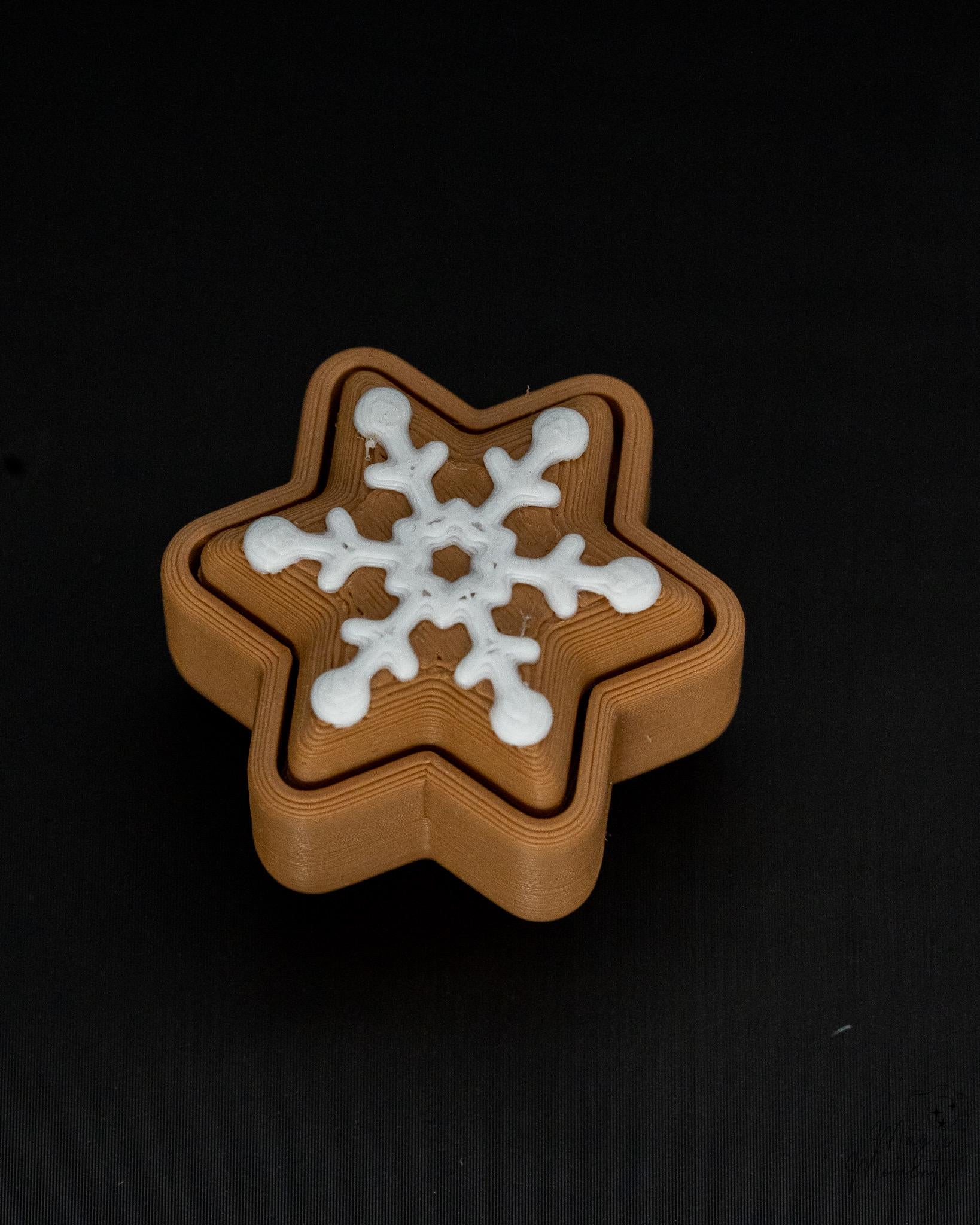 white icing gingerbread star clicker ornament