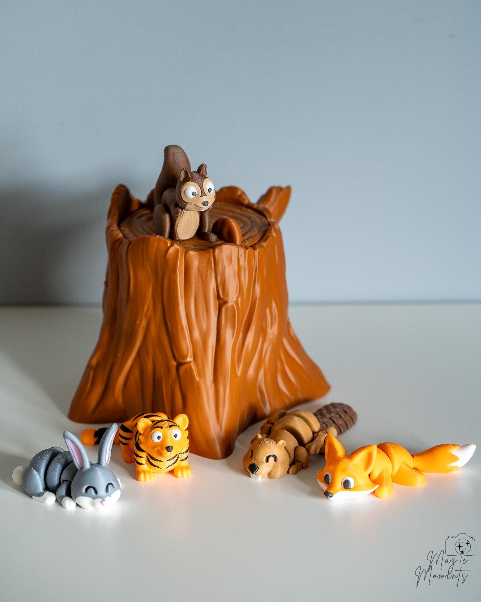 Cute woodland animal figures with tree stump display