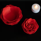 Decorative red rose tealight holders with glowing LED candles