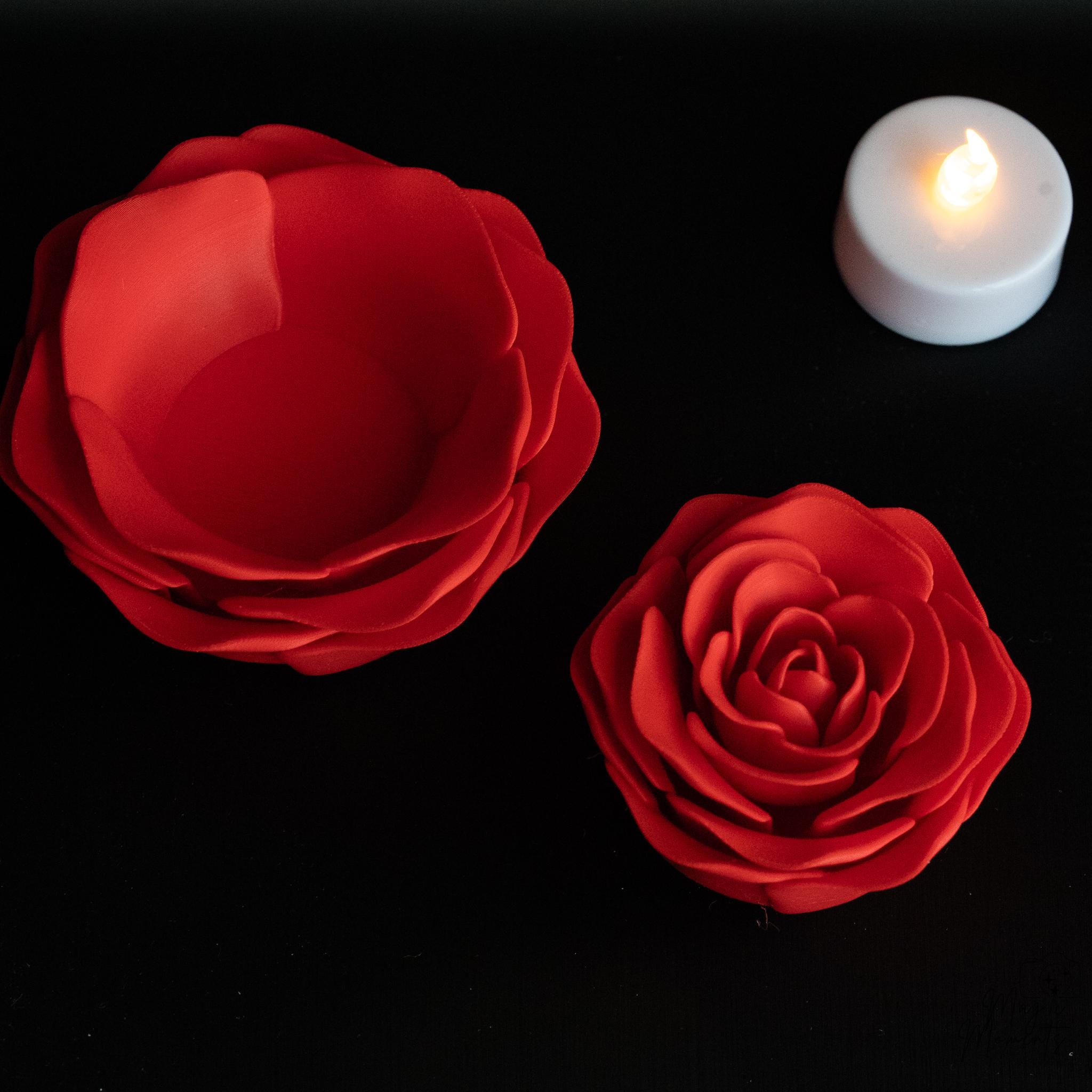 Decorative red rose tealight holders with glowing LED candles