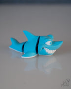 Blue shark figure with open mouth design